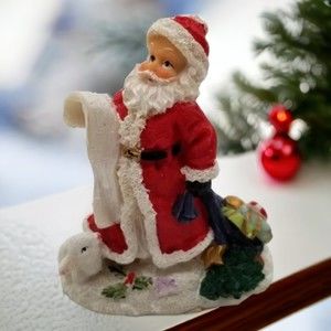 Enesco Santa Holding His List with Bunny Presents Figurine